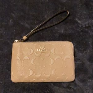 Creme Coach wristlet